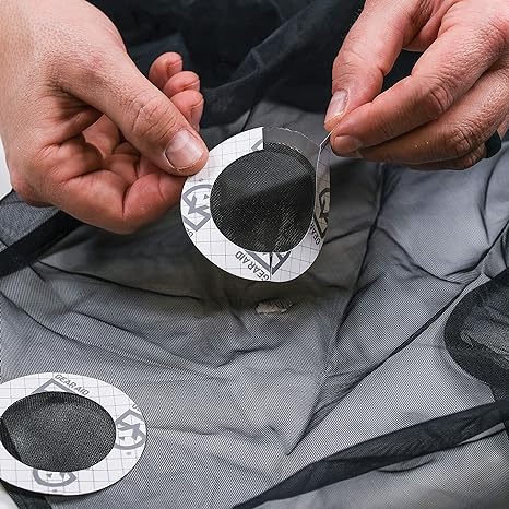 Tenacious Tape mesh repair patch on tent screen