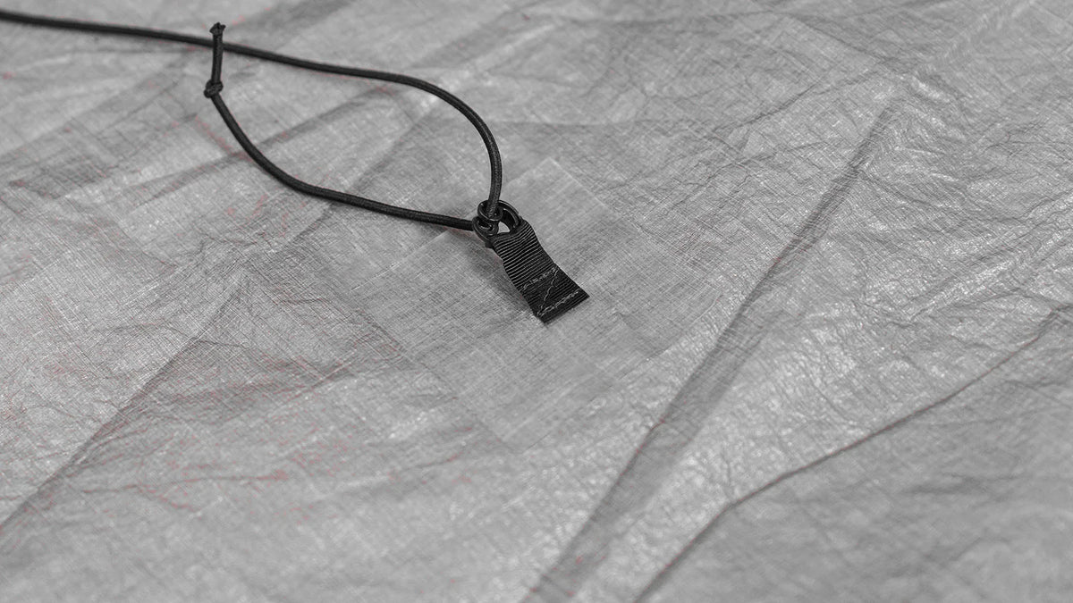 Stick on Springless Cord Lock – Zpacks